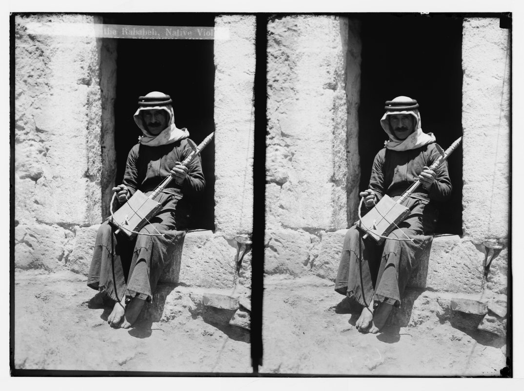 Rabebeh Playing a rababeh (ca. 1910) | Public Domain Image Archive