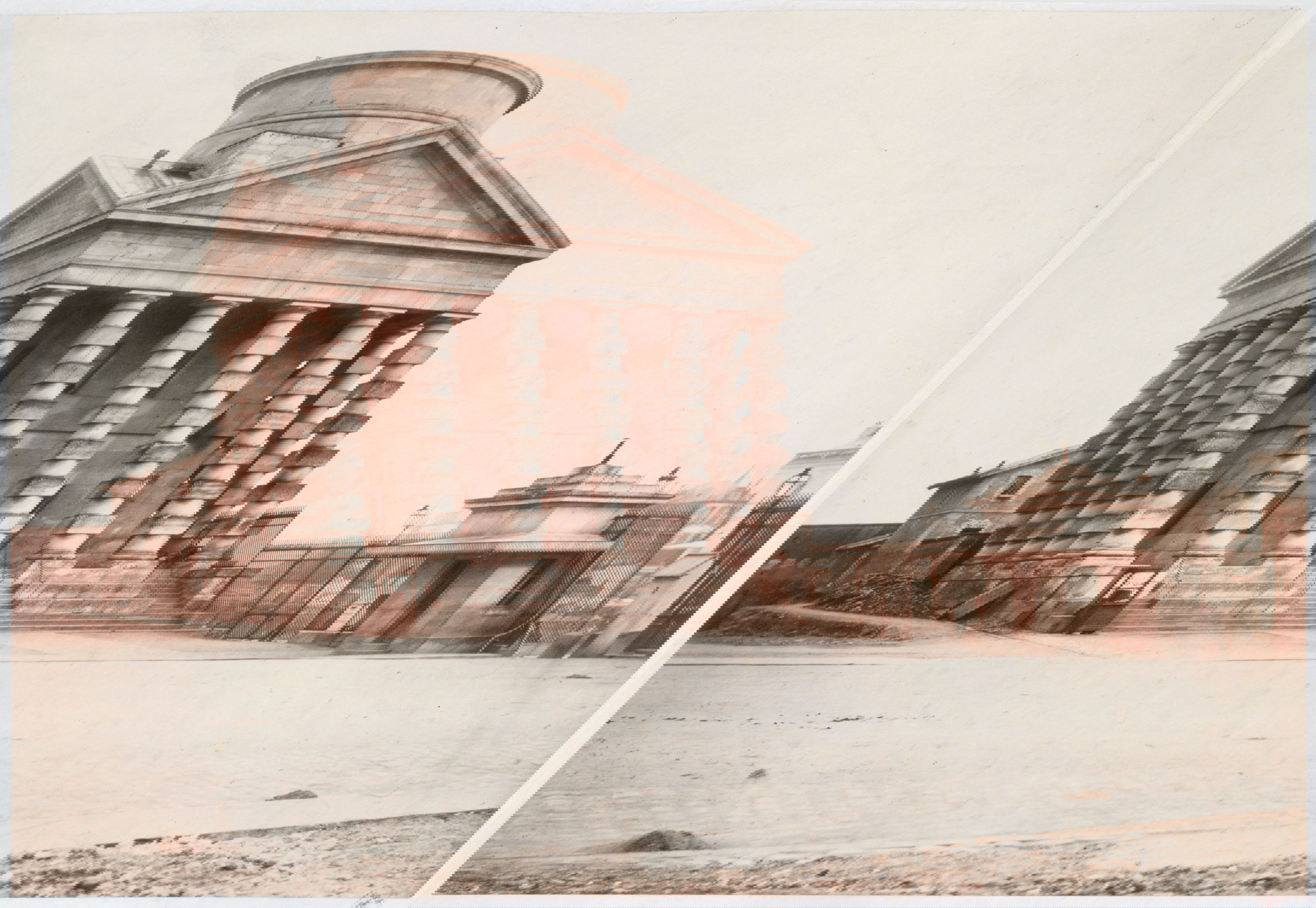 Neoclassical building with distinctive rusticated columns forming deep portico, topped by triangular pediment and cylindrical dome, with iron gates and guard house visible to the side